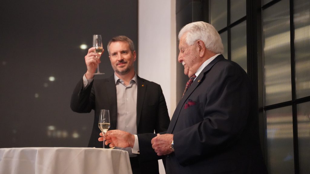 Will & Dr. Hold toasting